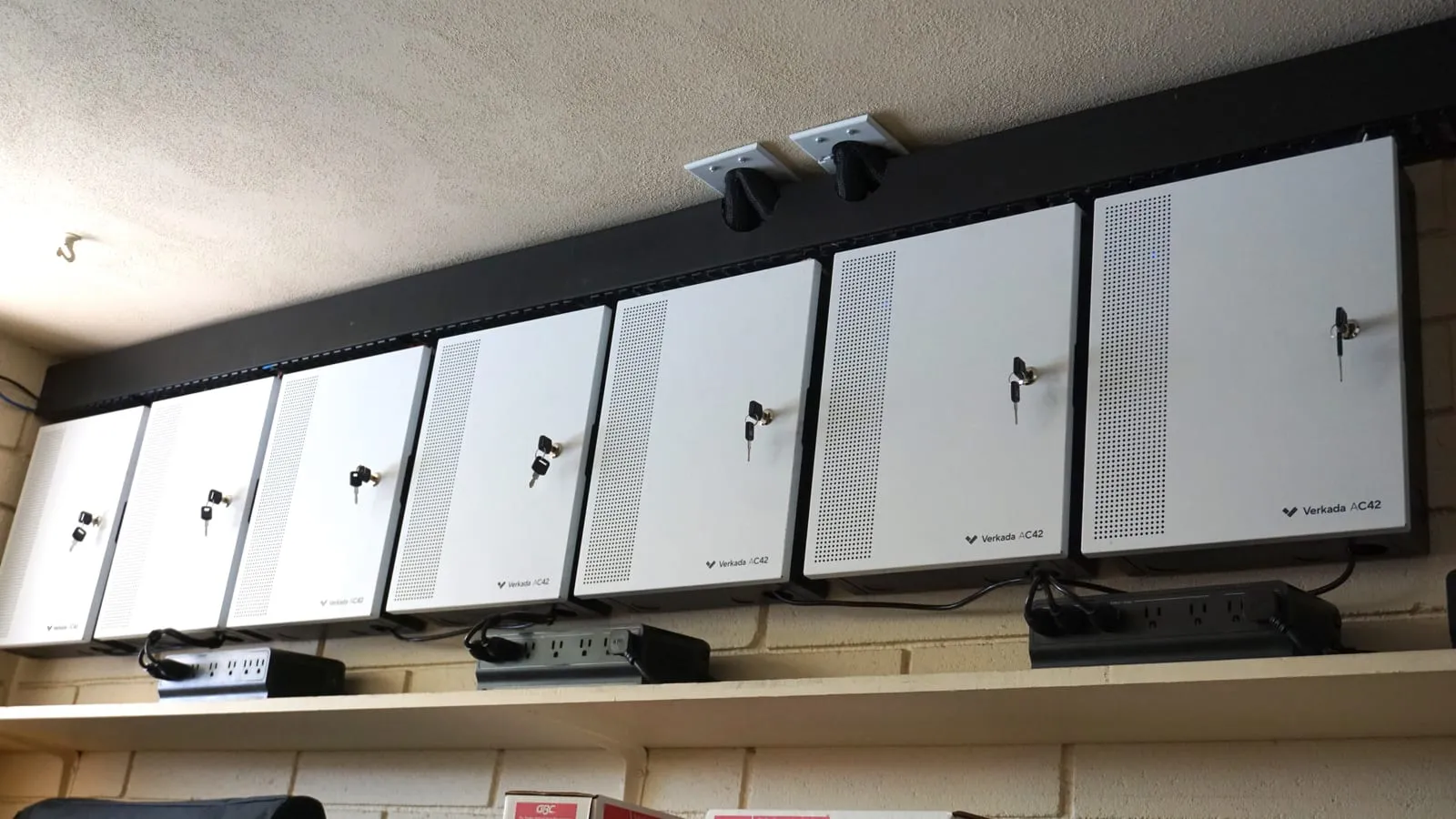 Row of Verkada AC42 access control panels in the equipment room